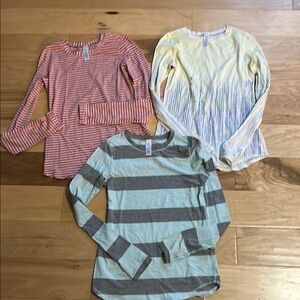 Girls Ivivva by Lululemon long sleeved shirts, size 12.